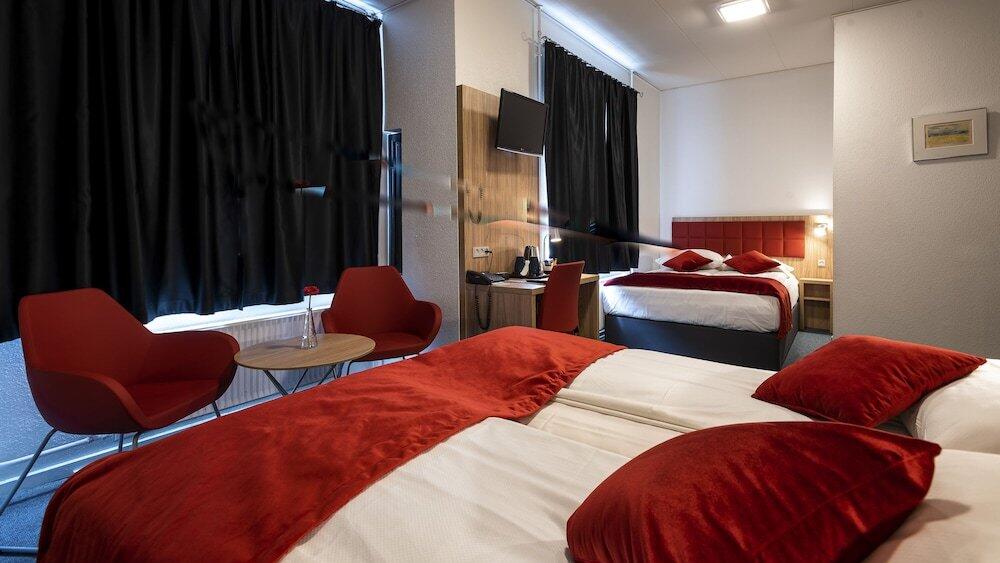 Foto de una habitación de Prinsen Hotel