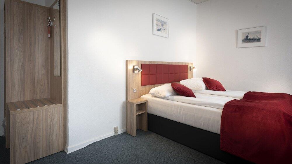 Foto de una habitación de Prinsen Hotel