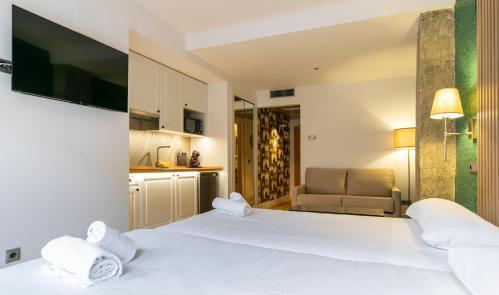 Foto de una habitación de H-A Aparthotel Hotel Quo