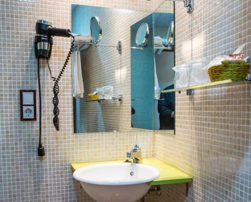 Foto del baño de Hotel Tibur
