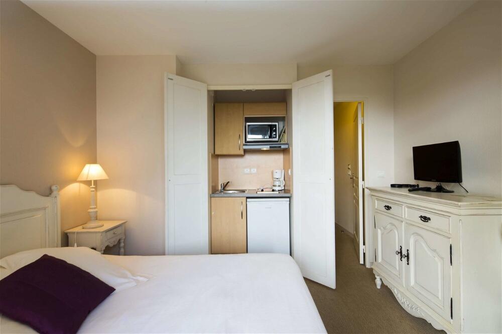 Foto de una habitación de Hotel Tulip Inn Honfleur Residence