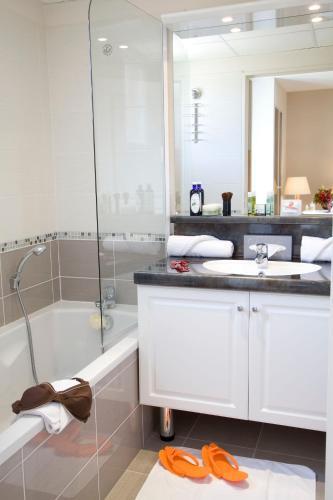 Foto del baño de Hotel Tulip Inn Honfleur Residence
