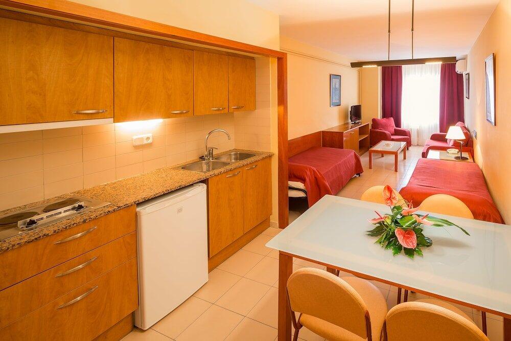 Foto de una habitación de Aparthotel Bertran