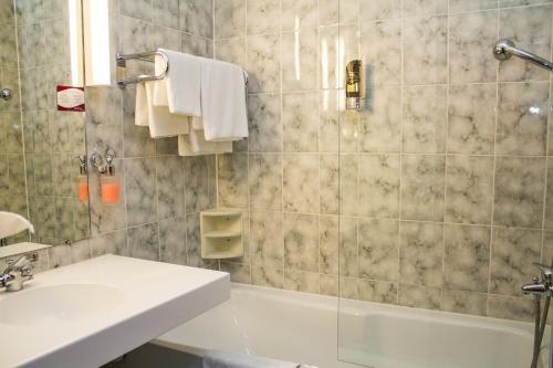 Foto del baño de Arvena Park Hotel