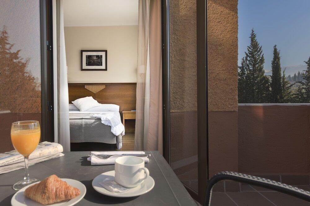 Foto de una habitación de Hotel Porcel Alixares