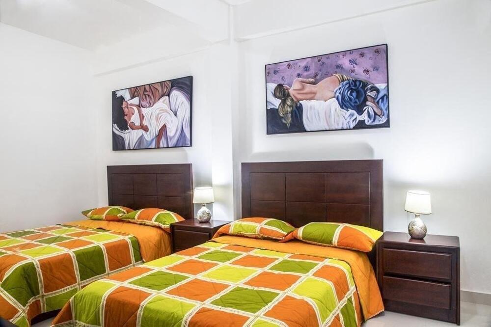 Foto de una habitación de Cataleya Hotel