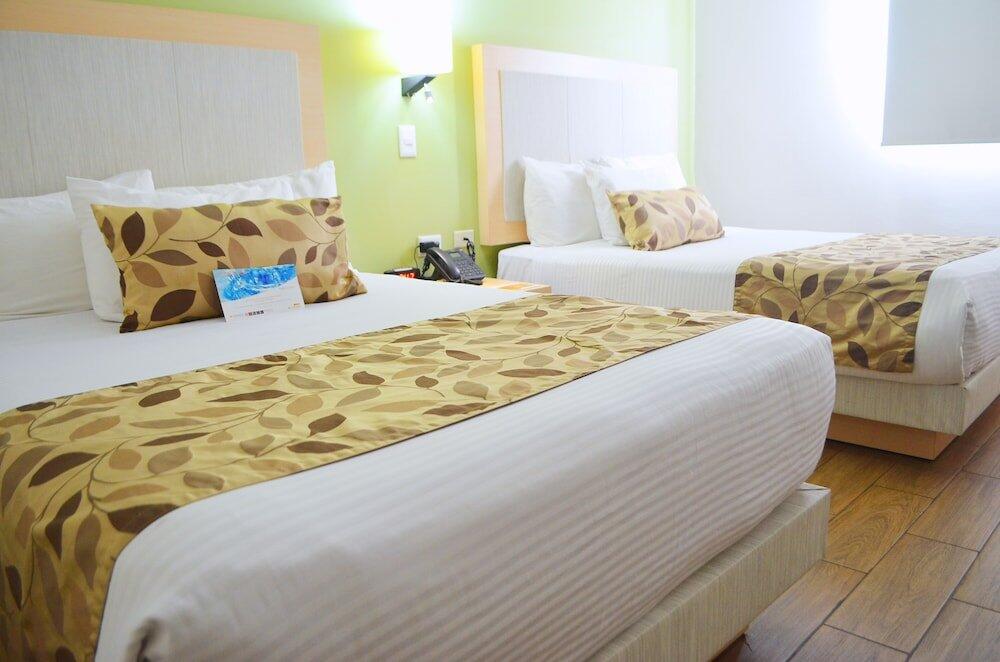Foto de una habitación de Hotel Sleep Inn Mazatlan