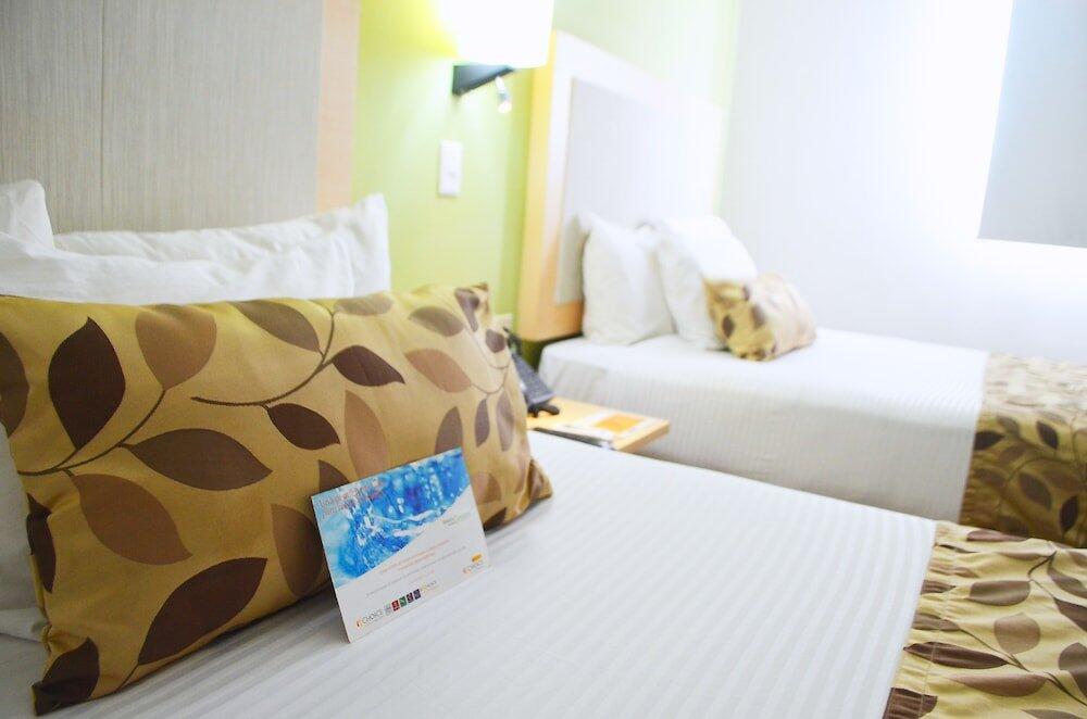 Foto de una habitación de Hotel Sleep Inn Mazatlan