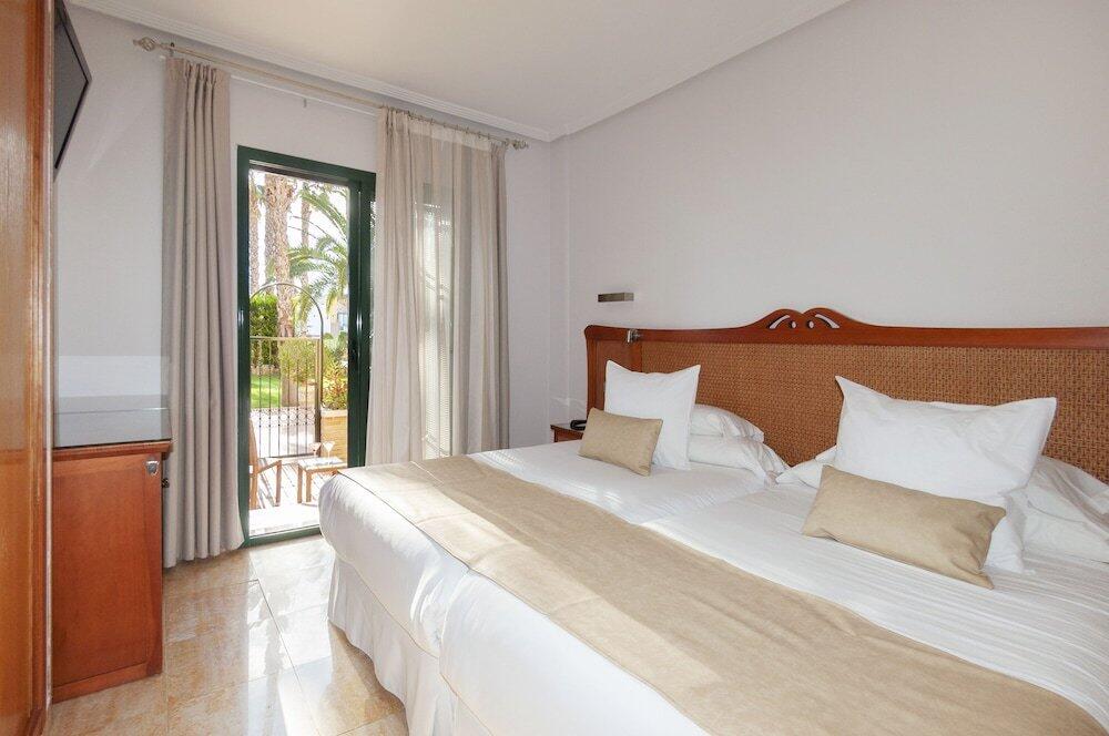 Foto de una habitación de Hotel La Laguna Spa &amp;amp; Golf