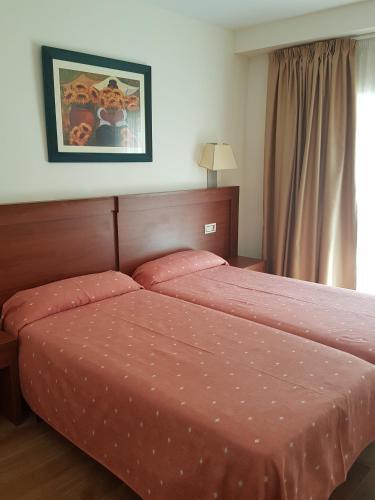 Foto de una habitación de Hotel Mayna