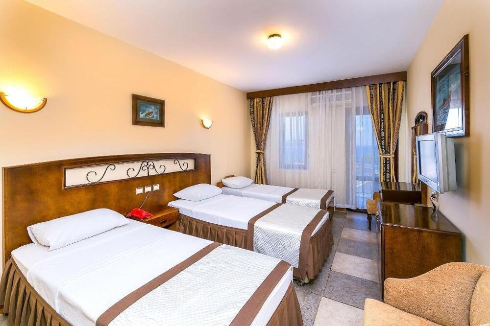 Foto de una habitación de Hotel Club Phellos