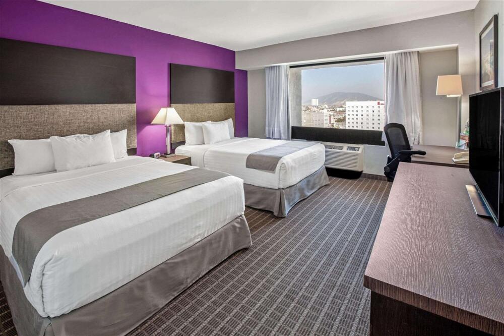 Foto de una habitación de CHN Hotel Monterrey Centro, Trademark Collection by Wyndham