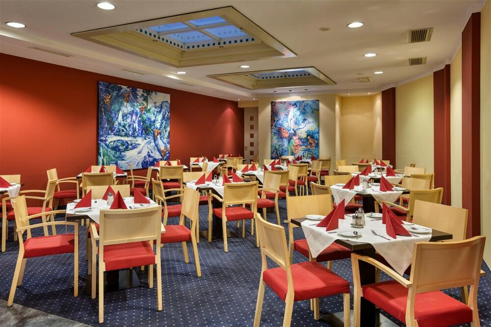 Foto de restauración de Austria Trend Hotel Ananas
