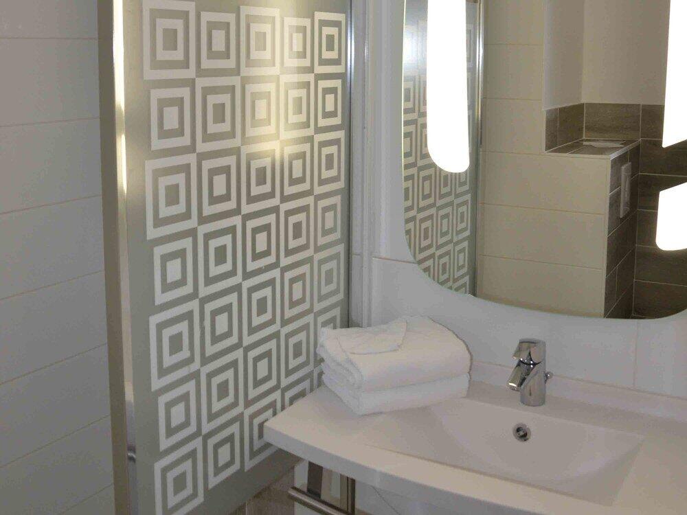 Foto de una habitación de Hotel ibis Europe Chalon Sur Saone