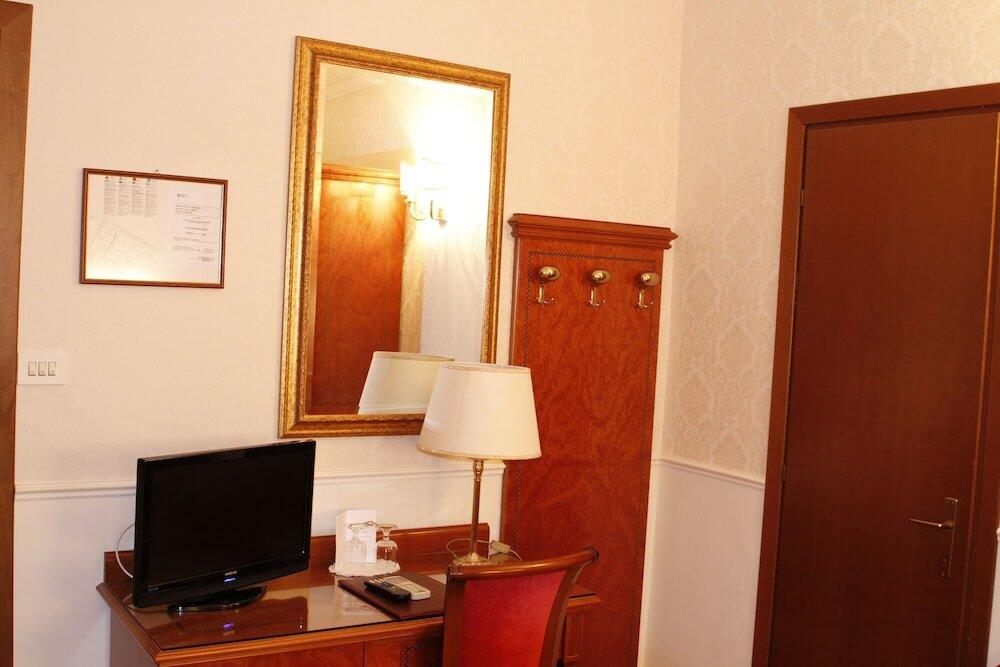Foto de una habitación de Hotel Genio