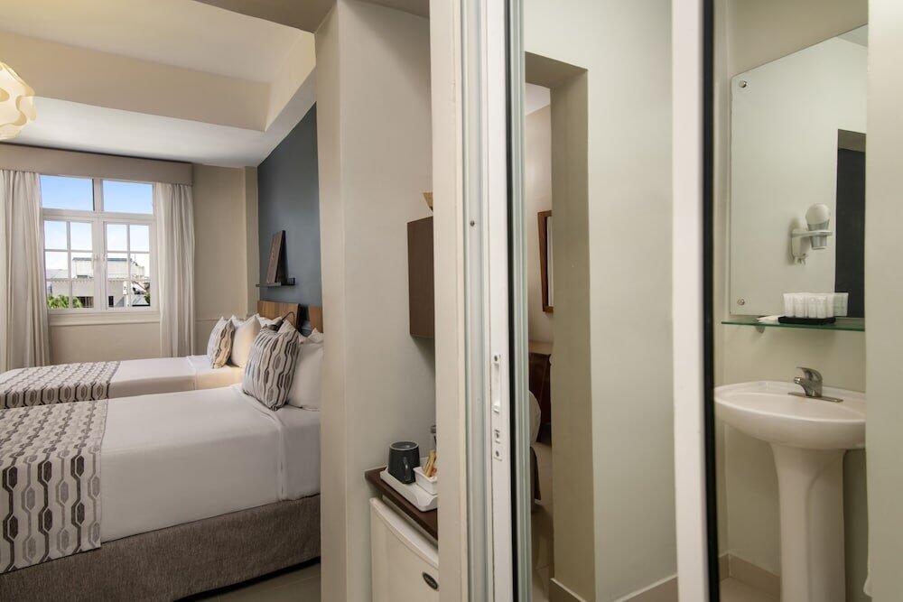 Foto de una habitación de Hotel Hodelpa Caribe Colonial