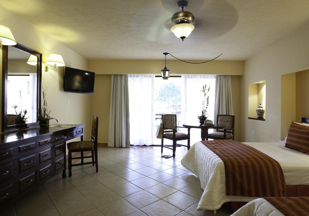 Foto de una habitación de Hotel Misión Comanjilla