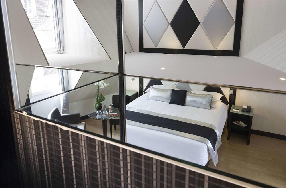 Foto de una habitación de Hotel L&amp;#039;Empire Paris - Louvre