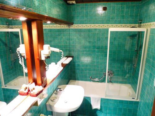 Foto de una habitación de Hotel Menardi