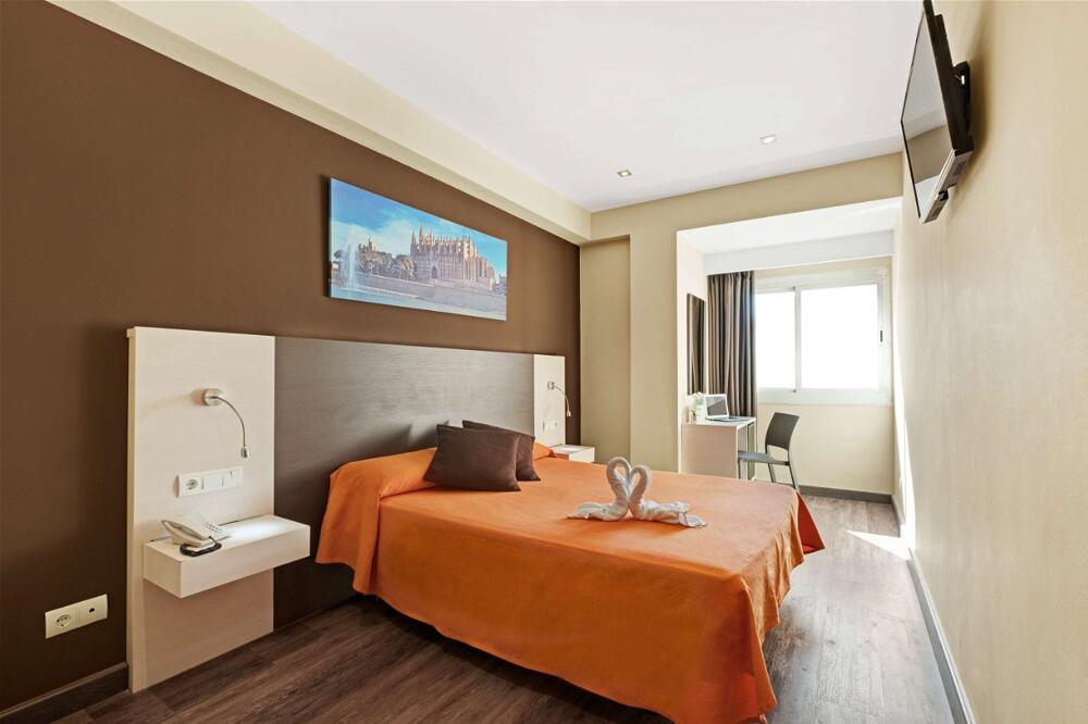 Foto de una habitación de Hotel Abelux