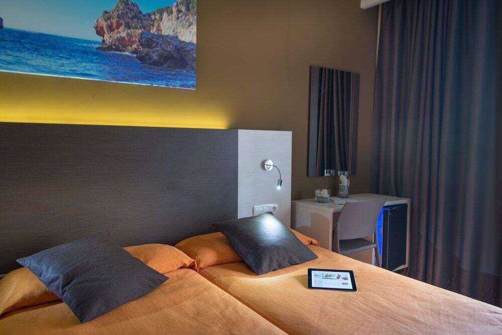 Foto de una habitación de Hotel Abelux