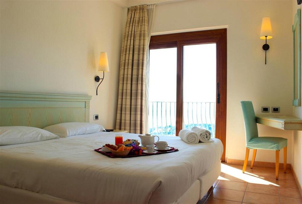 Foto de una habitación de Hotel Brancamaria