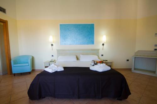 Foto de una habitación de Hotel Brancamaria