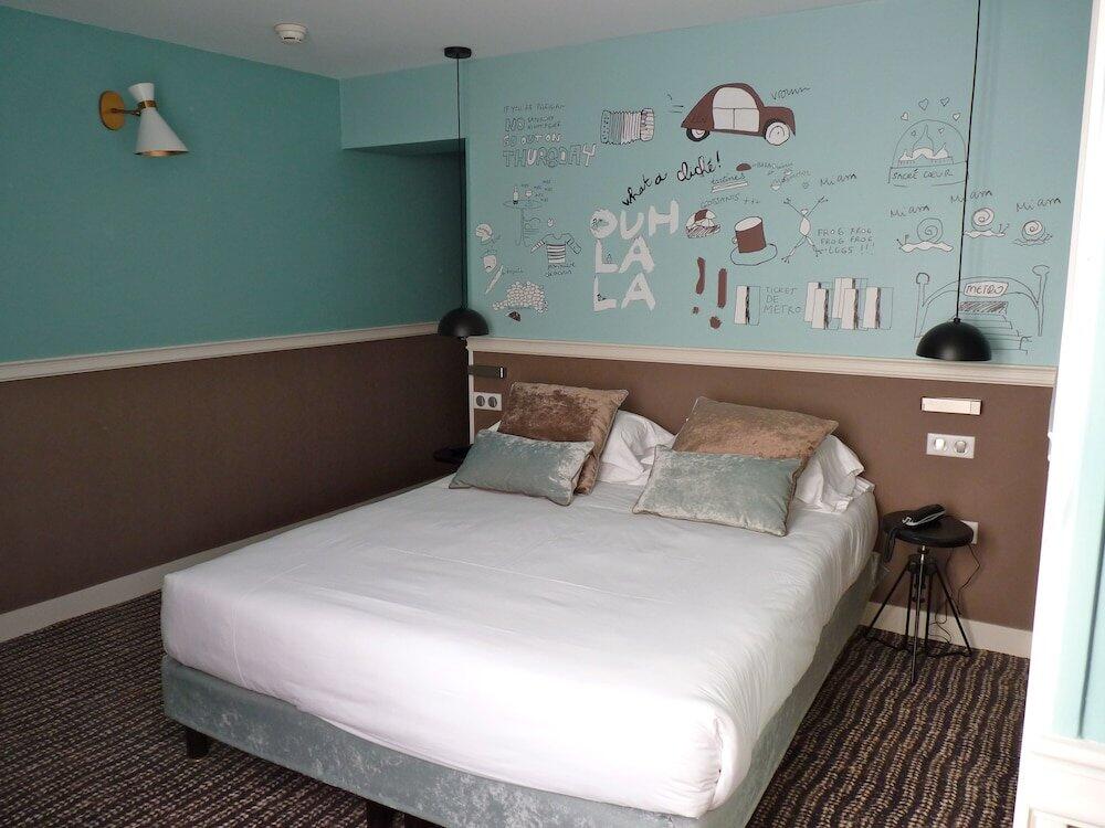 Foto de una habitación de Hôtel des 3 Poussins