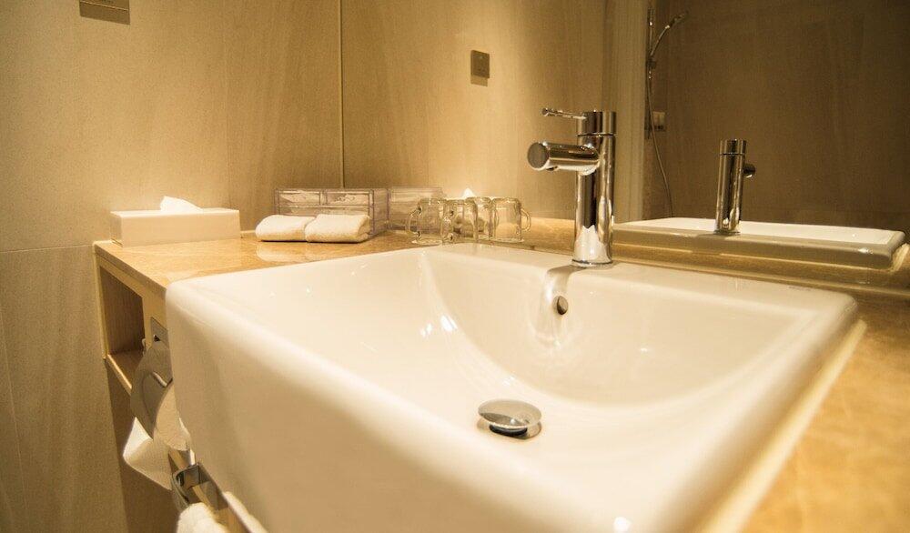 Foto del baño de Hotel B P International