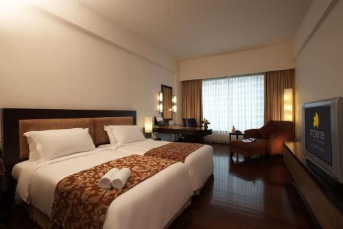 Foto de una habitación de Impiana KLCC Hotel