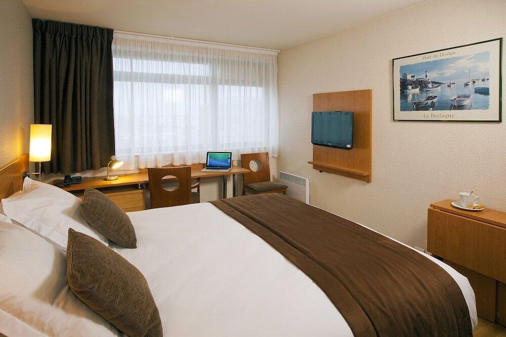 Foto de una habitación de Aparthotel Séjours &amp;amp; Affaires Rennes de Bretagne