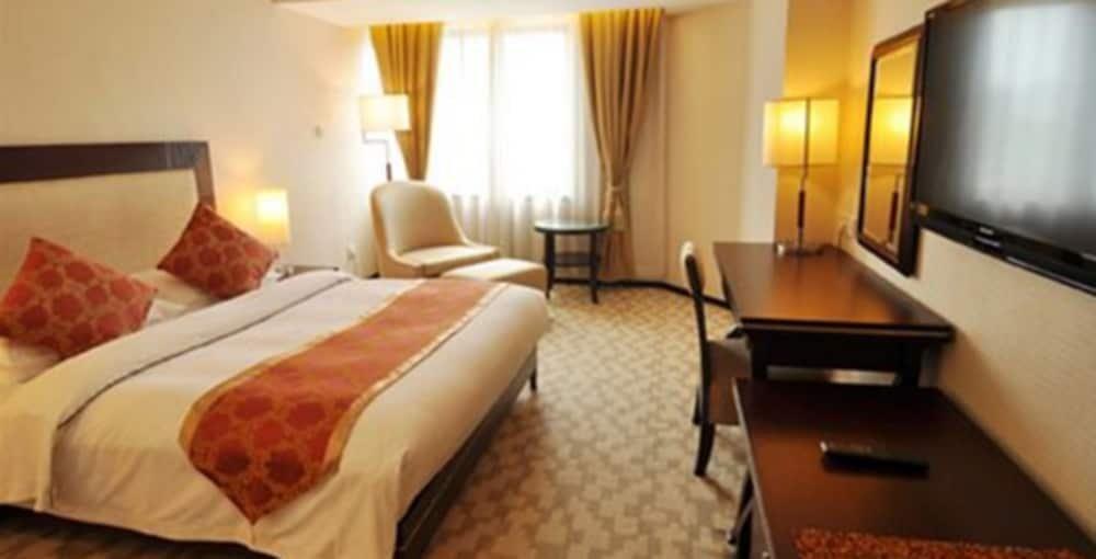 Foto de una habitación de Guangdong Victory Hotel