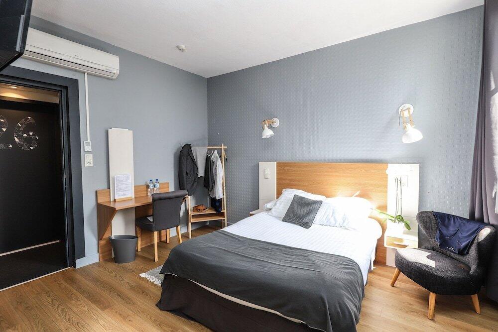 Foto de una habitación de Hôtel La Réserve de Brive
