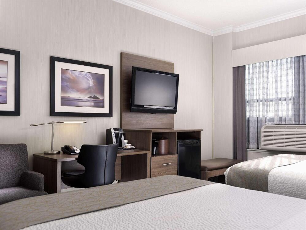 Foto de una habitación de BEST WESTERN PLUS Carlton Plaza Hotel