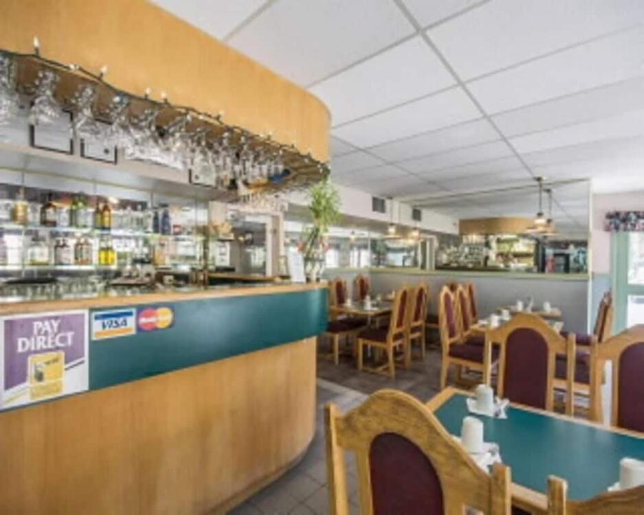 Foto de restauración de Motel 6 Surrey, Bc