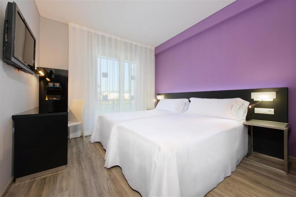 Foto de una habitación de Hotel Sercotel Córdoba Medina Azahara