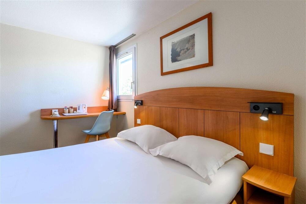 Foto de una habitación de Comfort Hotel Amiens Nord
