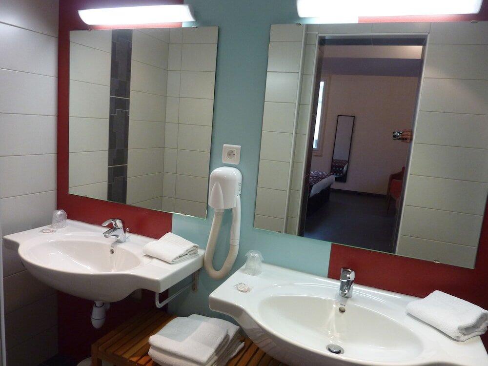 Foto del baño de Cit&amp;#039;Hotel de La Vallée
