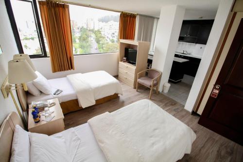 Foto de una habitación de Stanford Suites Hotel