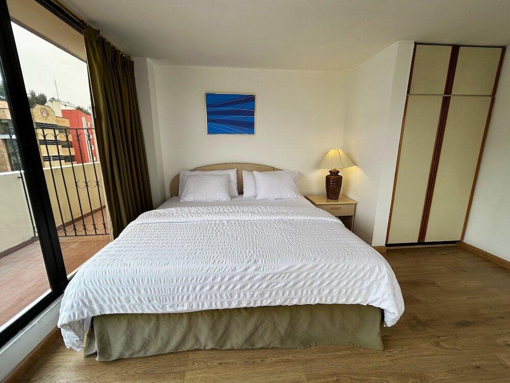 Foto de una habitación de Stanford Suites Hotel