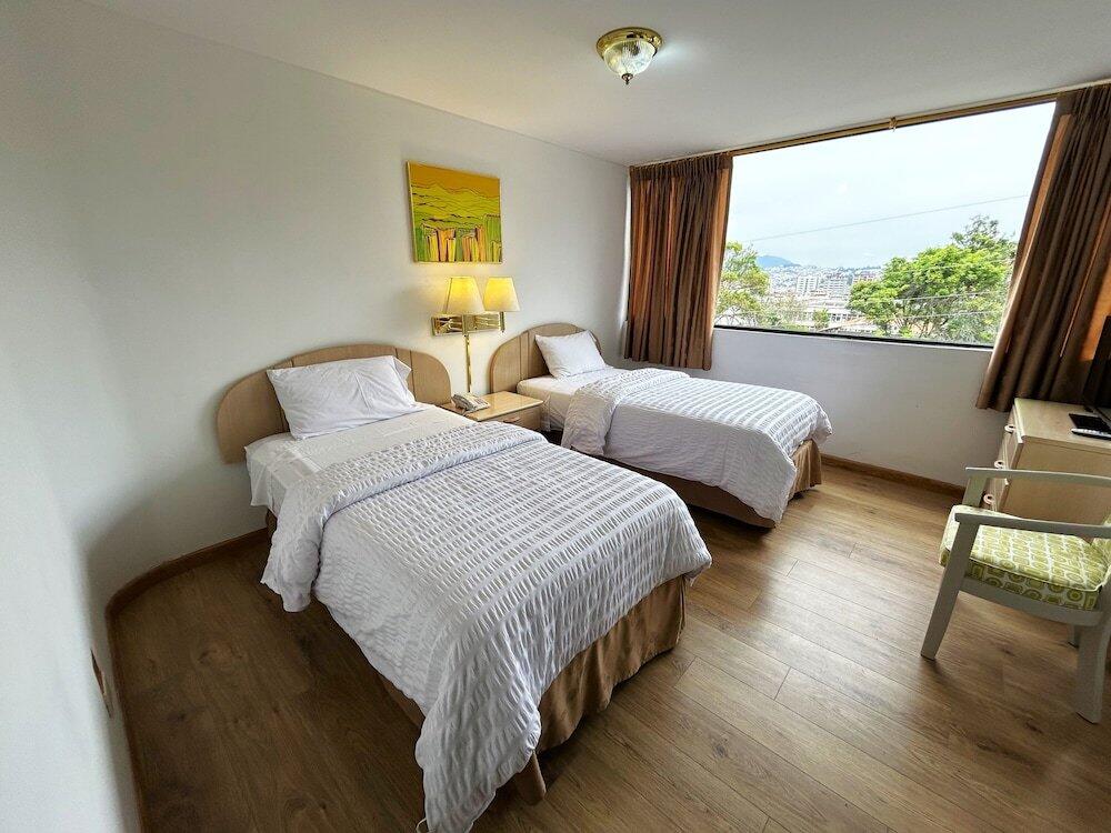 Foto de una habitación de Stanford Suites Hotel
