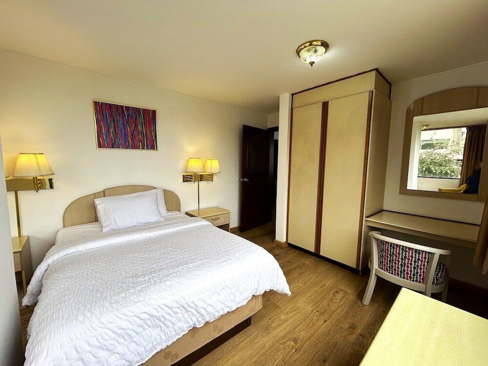 Foto de una habitación de Stanford Suites Hotel