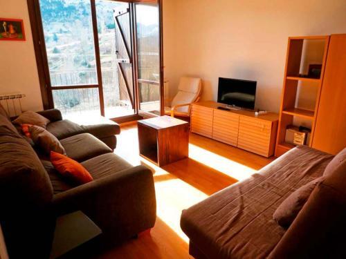 Foto de una habitación de Apartamentos Sallent de Gállego 3000
