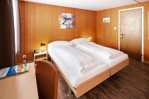 Foto de una habitación de Jungfrau Lodge, Swiss Mountain Hotel