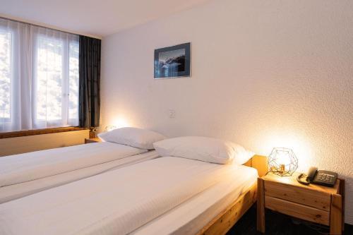 Foto de una habitación de Jungfrau Lodge, Swiss Mountain Hotel