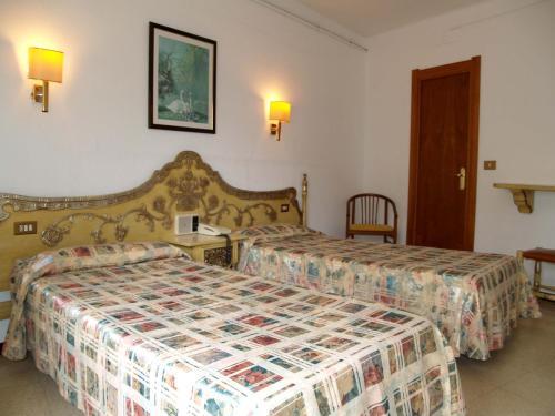 Foto de una habitación de Hotel Hostal del Sol