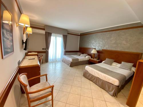 Foto de una habitación de Hotel Le Palme