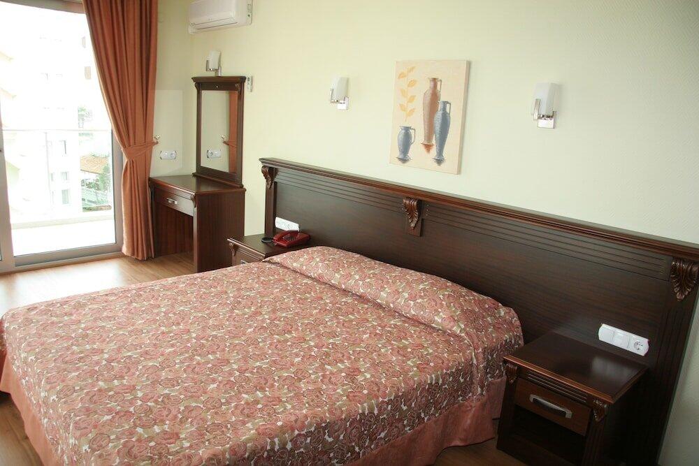 Foto de una habitación de Alkan Hotel