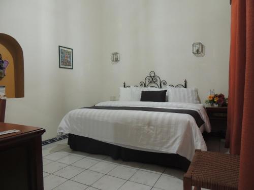 Foto de una habitación de Hotel Concierge Plaza Colima