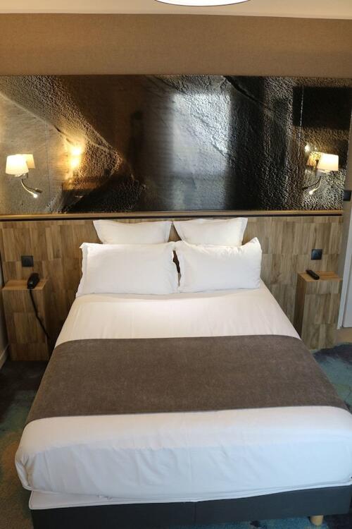 Foto de una habitación de Hotel Le Saint Aubert